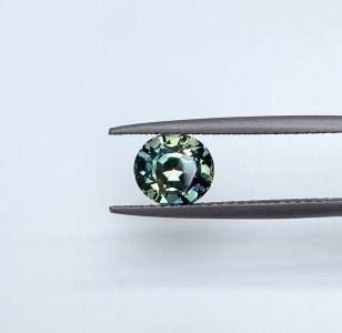 1.65 carat Teal/ Party Sapphire