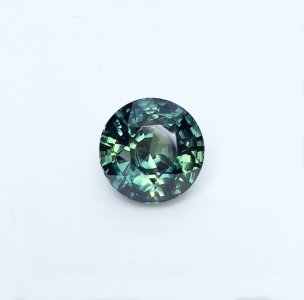 4.05 carat Teal Sapphire is well cut to bring out the best colour and luster